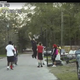 Police Officer Bobby Whites dunks a basketball while playing with neighborhood kids in Gainesville, Fla., Jan. 15, 2016.
Gainesville Police Department via Facebook
